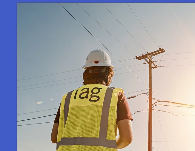 IAG field technician inspecting utility infrastructure